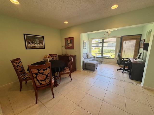 4941 Dovewood Rd Unit A, Boynton Beach, FL 33436 - dining area with baseboards, a textured ceiling, recessed lighting, and light tile patterned floors