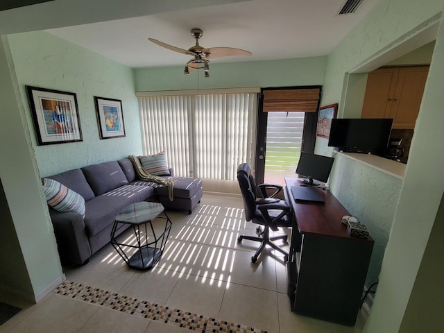 4941 Dovewood Rd Unit A, Boynton Beach, FL 33436 - office featuring light tile patterned flooring, a textured wall, a ceiling fan, and visible vents