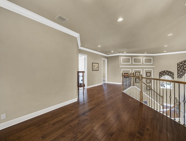 17384 Vistancia Cir, Boca Raton, FL 33496 - empty room with baseboards, ornamental molding, recessed lighting, dark wood-style floors, and visible vents