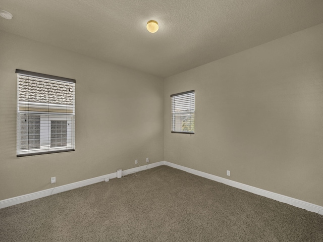 17384 Vistancia Cir, Boca Raton, FL 33496 - unfurnished room with dark colored carpet and baseboards