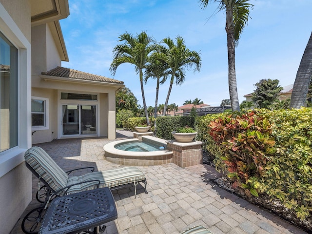 17384 Vistancia Cir, Boca Raton, FL 33496 - view of patio featuring an outdoor hot tub