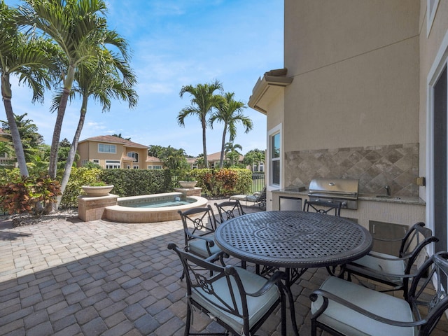 17384 Vistancia Cir, Boca Raton, FL 33496 - view of patio with grilling area, outdoor dining area, an outdoor hot tub, and an outdoor kitchen