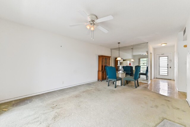 4321 NW 16th St Unit C302, Lauderhill, FL 33313 - living room with ceiling fan, carpet floors, and baseboards