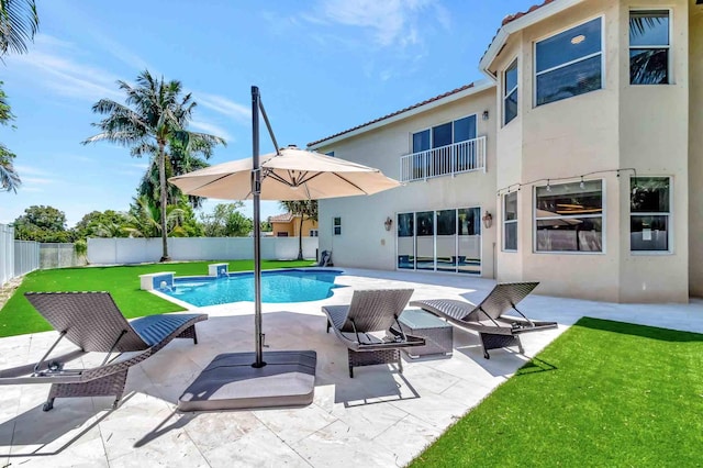 view of swimming pool featuring a patio area