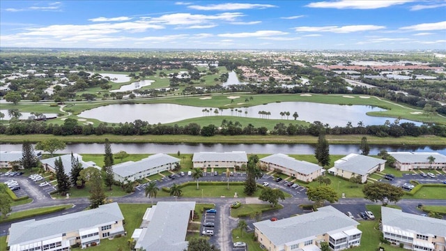 1905 NW 18th St Unit 101, Delray Beach, FL 33445 - aerial view of property and surrounding area featuring a large body of water, nearby suburban area, and a golf course