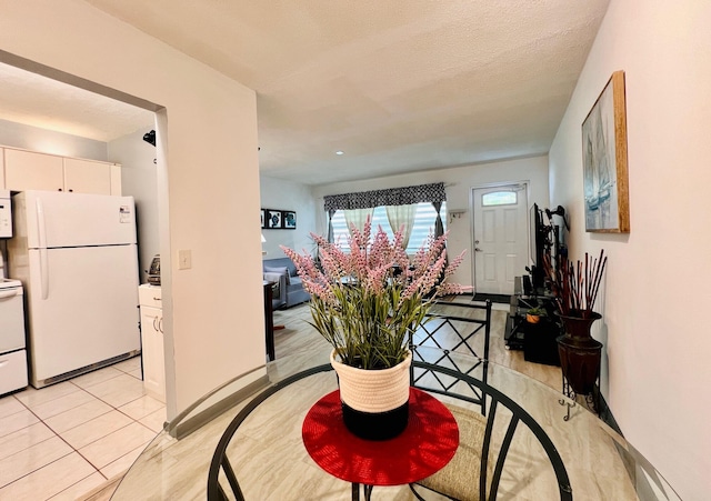 135 Dorchester F, West Palm Beach, FL 33417 - dining area featuring a textured ceiling