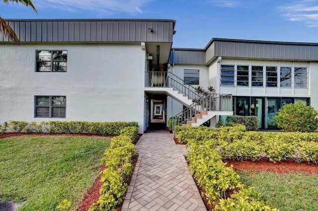 475 Piedmont J, Delray Beach, FL 33484 - view of property featuring stairs