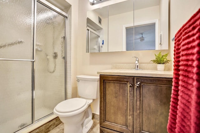 475 Piedmont J, Delray Beach, FL 33484 - bathroom with toilet, a shower stall, and vanity
