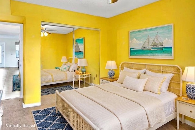 475 Piedmont J, Delray Beach, FL 33484 - bedroom with a closet, baseboards, and wood finished floors