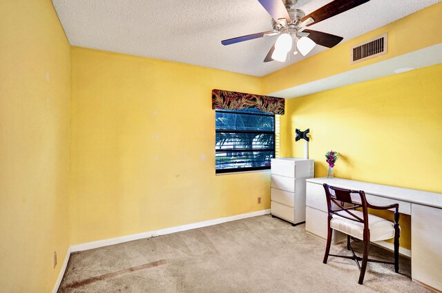 475 Piedmont J, Delray Beach, FL 33484 - home office featuring a textured ceiling, ceiling fan, carpet, and visible vents