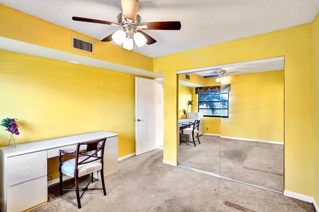 475 Piedmont J, Delray Beach, FL 33484 - carpeted office featuring a textured ceiling, baseboards, a ceiling fan, and visible vents