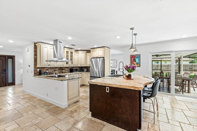 21786 Banyanwood Rd, Boca Raton, FL 33433 - kitchen with a sink, stone tile flooring, stainless steel appliances, cream cabinets, and island range hood