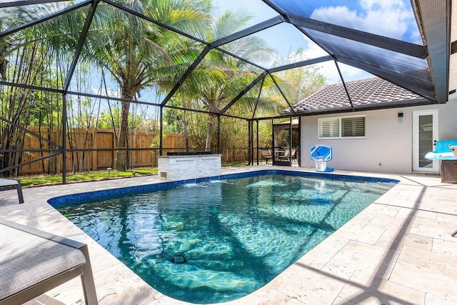 21786 Banyanwood Rd, Boca Raton, FL 33433 - view of swimming pool featuring a lanai, fence, a fenced in pool, and a patio area