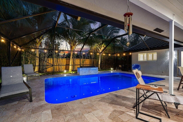 21786 Banyanwood Rd, Boca Raton, FL 33433 - view of swimming pool featuring fence, glass enclosure, a fenced in pool, and a patio area