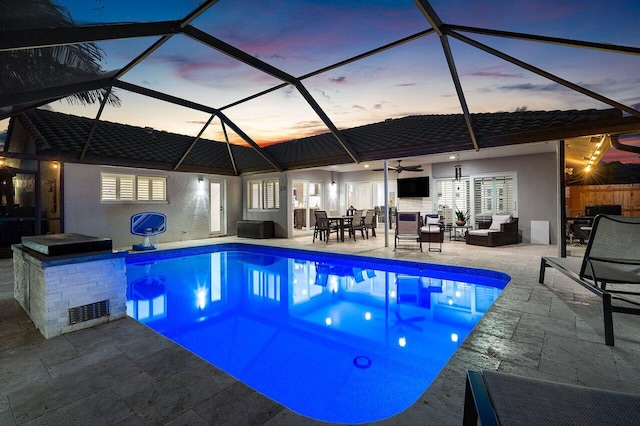 21786 Banyanwood Rd, Boca Raton, FL 33433 - outdoor pool featuring an outdoor hangout area, a patio area, glass enclosure, outdoor dining space, and a ceiling fan