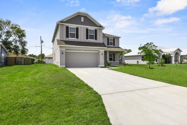 view of front facade featuring roof with shingles, driveway, an attached garage, a front yard, and fence