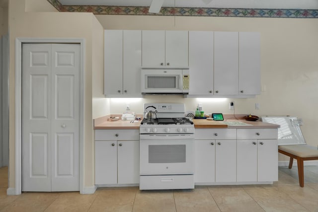 tiled dining space with baseboards