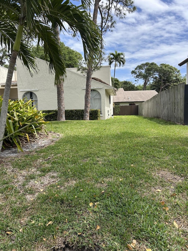 view of yard with fence