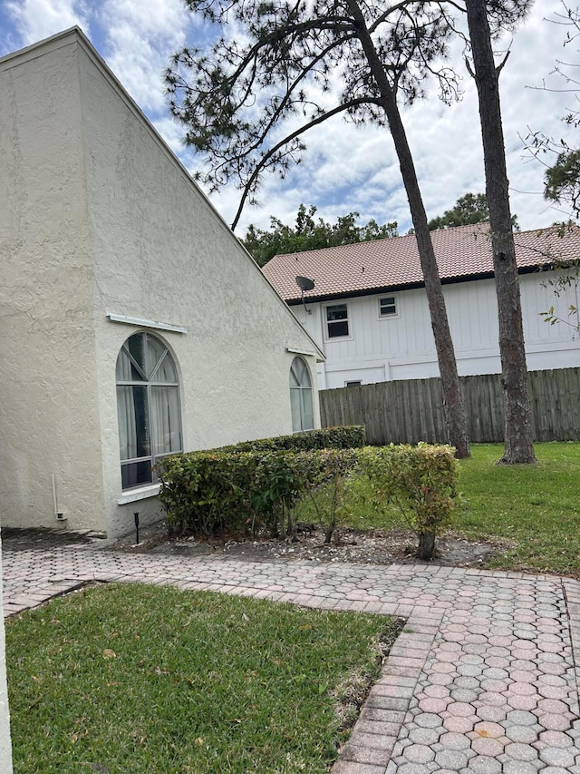 view of yard with a patio and fence