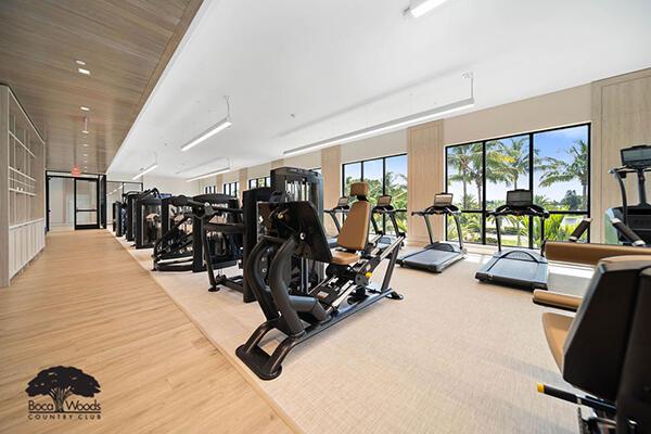 workout area with wood finished floors