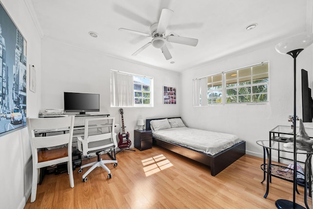 941 NW 26th Ct, Wilton Manors, FL 33311 - bedroom featuring ceiling fan, ornamental molding, and wood finished floors