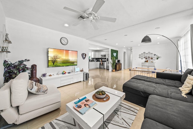 941 NW 26th Ct, Wilton Manors, FL 33311 - living area featuring a ceiling fan, light tile patterned flooring, and recessed lighting