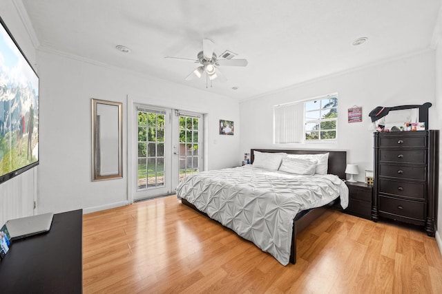 941 NW 26th Ct, Wilton Manors, FL 33311 - bedroom with crown molding, access to outside, light wood-style floors, and a ceiling fan