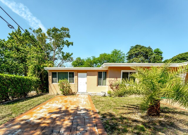 1285 NE 154th St, North Miami Beach, FL 33162 - ranch-style home with stucco siding
