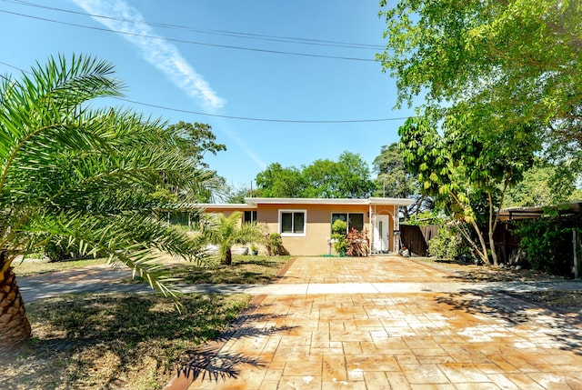 1285 NE 154th St, North Miami Beach, FL 33162 - rear view of house with stucco siding