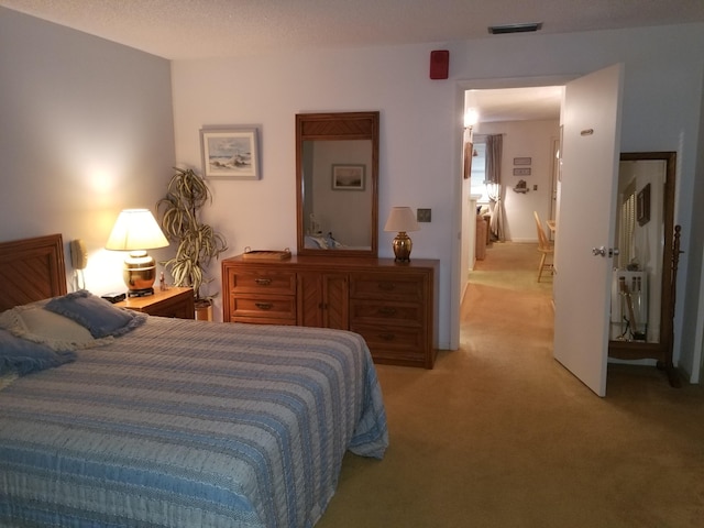 7 Lake Vista Trl Unit 204, Port Saint Lucie, FL 34952 - bedroom with light carpet