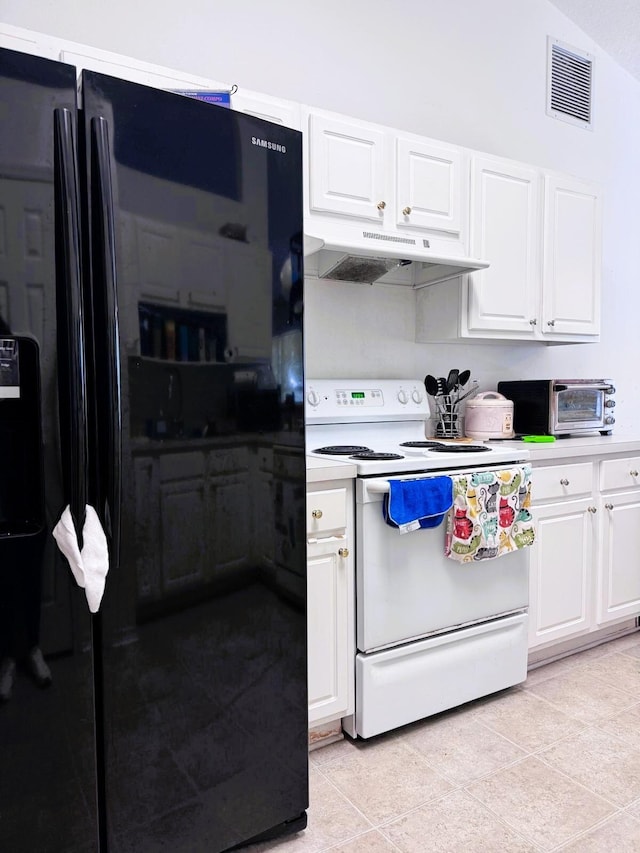 5155 NW N Macedo Blvd, Port Saint Lucie, FL 34983 - kitchen with electric stove, under cabinet range hood, white cabinetry, and light countertops