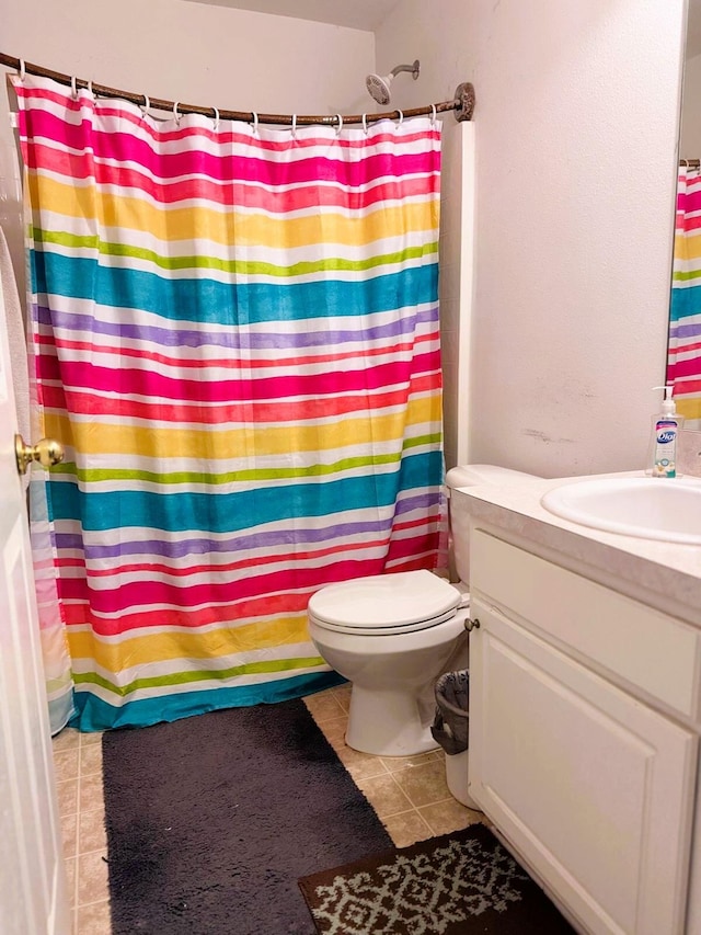 5155 NW N Macedo Blvd, Port Saint Lucie, FL 34983 - full bath featuring tile patterned floors, a shower with curtain, and vanity