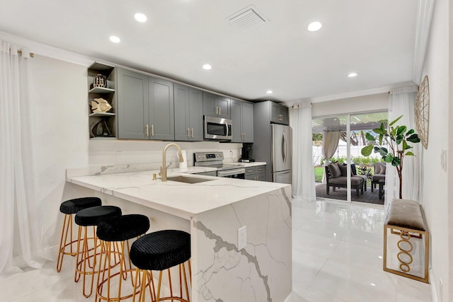 kitchen with light tile patterned floors, open shelves, visible vents, a sink, and stainless steel appliances