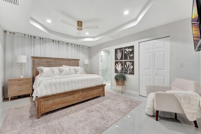 bedroom with a closet, recessed lighting, a raised ceiling, visible vents, and ceiling fan