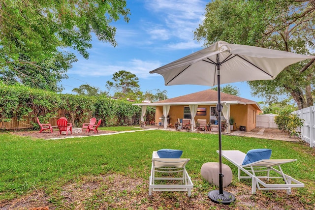view of yard featuring a fenced backyard and a patio area