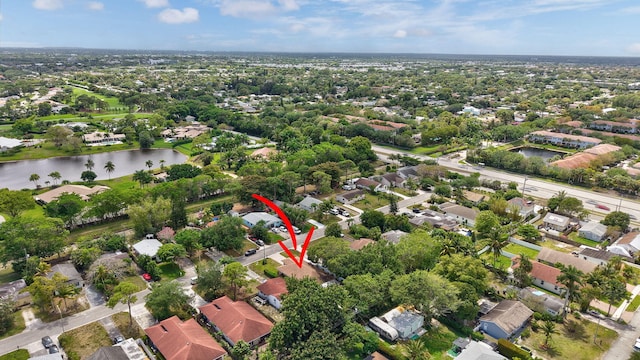 aerial view featuring a residential view and a water view