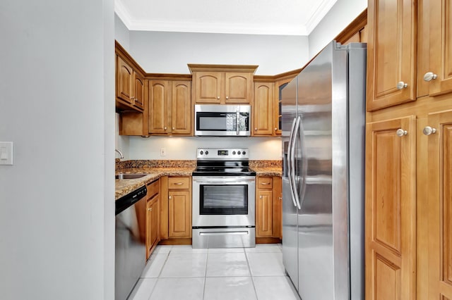 5439 Verona Dr Unit P, Boynton Beach, FL 33437 - kitchen with stainless steel appliances, a sink, light stone counters, light tile patterned floors, and ornamental molding