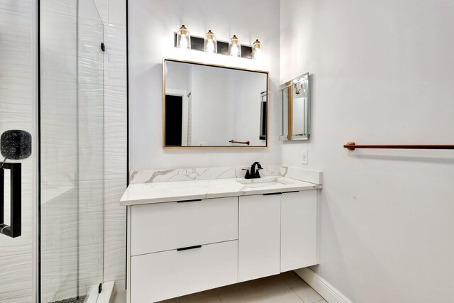 5439 Verona Dr Unit P, Boynton Beach, FL 33437 - full bathroom featuring vanity, a shower stall, tile patterned flooring, and baseboards
