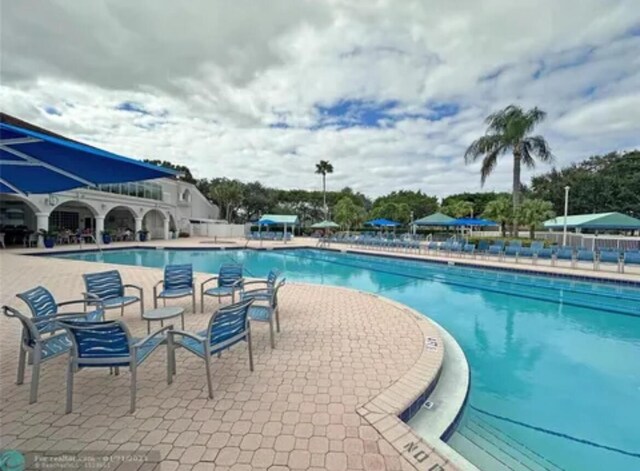 5439 Verona Dr Unit P, Boynton Beach, FL 33437 - community pool with a patio area