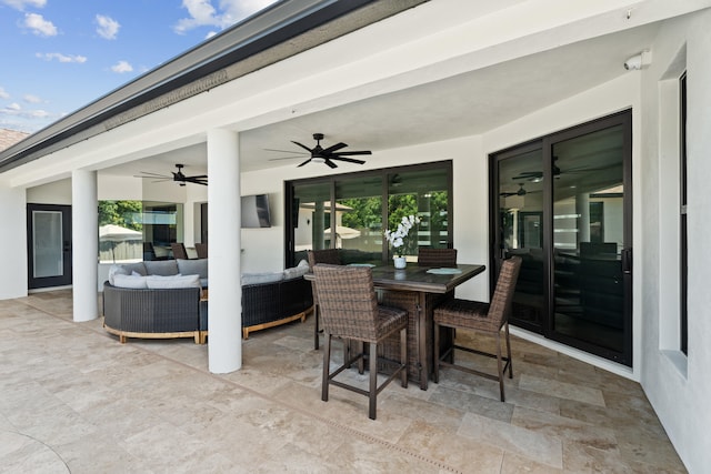 1784 SW Erie St, Port Saint Lucie, FL 34953 - view of patio featuring outdoor dining area, a ceiling fan, and an outdoor hangout area
