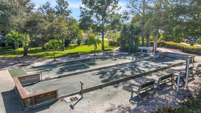 9872 SE Little Club Way S, Tequesta, FL 33469 - surrounding community with shuffleboard and a yard