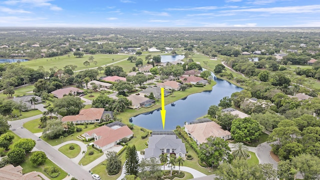 aerial view featuring a water view and a residential view