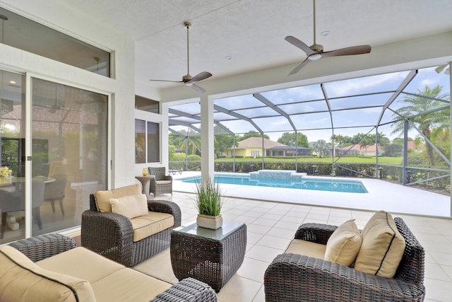 view of patio / terrace featuring an outdoor pool, ceiling fan, a lanai, and an outdoor hangout area