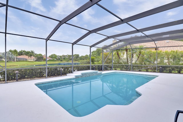 outdoor pool with a water view, a patio area, and a lanai