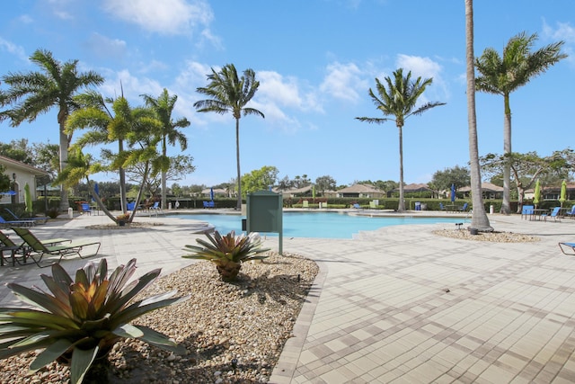 community pool featuring a patio area