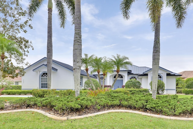 view of side of property with stucco siding