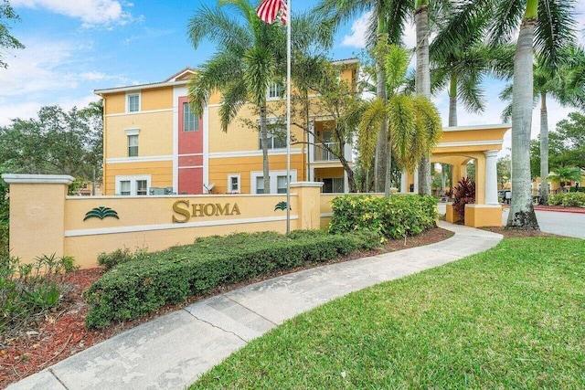 3203 Shoma Dr Unit 294/32, Royal Palm Beach, FL 33414 - community / neighborhood sign featuring a lawn