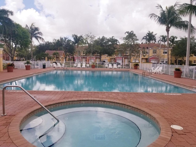 3203 Shoma Dr Unit 294/32, Royal Palm Beach, FL 33414 - pool featuring fence and a patio area