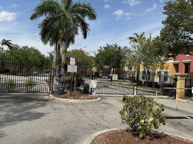 3203 Shoma Dr Unit 294/32, Royal Palm Beach, FL 33414 - view of gate with fence