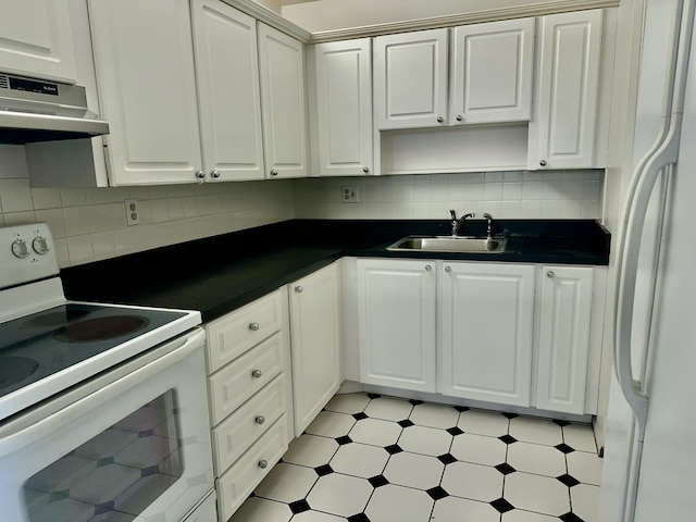 12394 Alternate A1A O7, Palm Beach Gardens, FL 33410 - kitchen with a sink, dark countertops, range hood, light floors, and white appliances